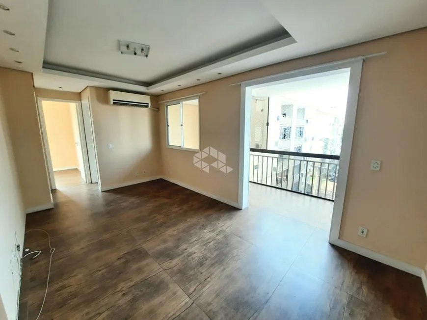 Foto 1 de Apartamento com 2 Quartos à venda, 58m² em Humaitá, Porto Alegre