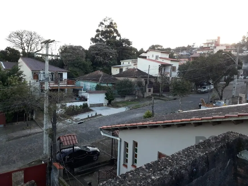 Foto 1 de Casa com 4 Quartos à venda, 179m² em Nonoai, Porto Alegre