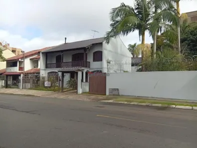 Casa de Condomínio com 4 Quartos para alugar, 438m² no Marechal Rondon, Canoas