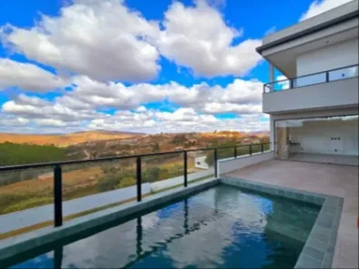Casa de Condomínio com 4 Quartos à venda, 401m² no Balneário Água Limpa, Nova Lima