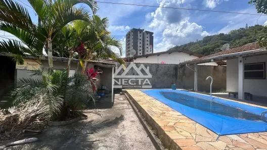 Casa com 2 Quartos à venda, 153m² no Loteamento Balneário Camburi, Caraguatatuba