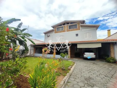 Sobrado com 4 Quartos à venda, 450m² no Loteamento Jardim Aruan, Caraguatatuba