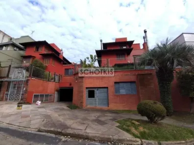 Casa com 4 Quartos para alugar, 272m² no Vila Jardim, Porto Alegre