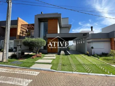 Casa de Condomínio com 3 Quartos para venda ou aluguel, 160m² no Loteamento Jardim Timbaúva, Gravataí