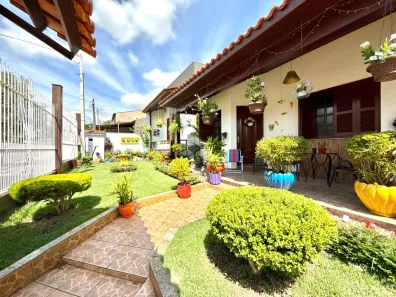 Casa com 4 Quartos à venda, 286m² no Jardim Algarve, Alvorada