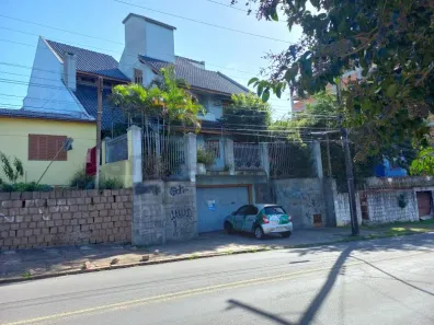 Casa com 3 Quartos para alugar, 500m² no Jardim Itu, Porto Alegre