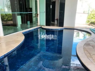 Casa de Condomínio com 4 Quartos à venda, 297m² no Nova Uberlândia, Uberlândia