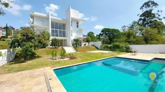 Casa de Condomínio com 4 Quartos para alugar, 566m² no Jardim Indaiá, Embu das Artes