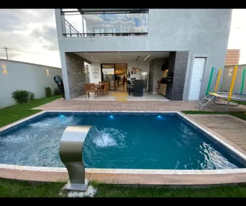 Casa de Condomínio com 4 Quartos para venda ou aluguel, 300m² no Cidade Alpha, Eusébio