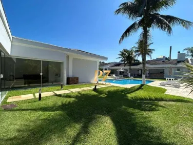 Casa de Condomínio com 7 Quartos para alugar, 628m² no Jardim Acapulco, Guarujá