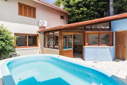 Casa de Condomínio com 3 Quartos à venda, 234m² no Cavalhada, Porto Alegre
