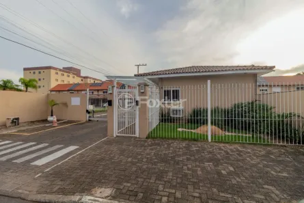 Casa de Condomínio com 2 Quartos à venda, 103m² no Rio Branco, Canoas