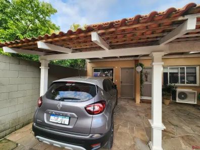 Casa de Condomínio com 2 Quartos à venda, 108m² no Rio Branco, Canoas
