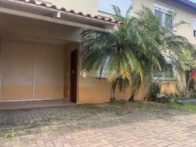 Casa de Condomínio com 3 Quartos para alugar, 100m² no Harmonia, Canoas