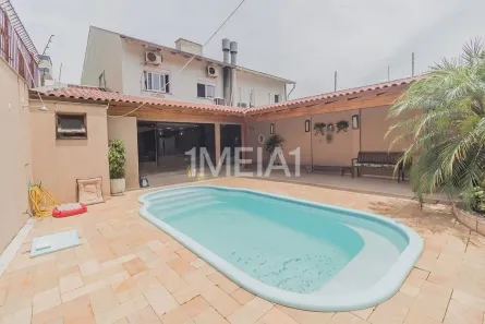 Casa com 4 Quartos para alugar, 209m² no Jardim Itu, Porto Alegre