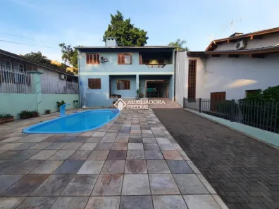 Casa com 4 Quartos para alugar, 242m² no Ouro Branco, Novo Hamburgo