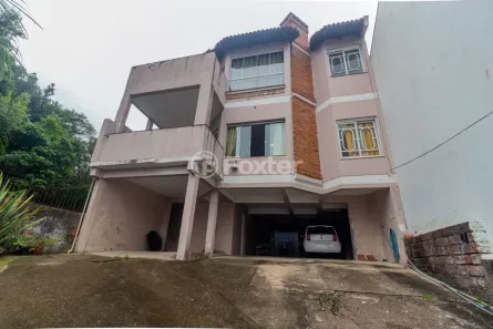 Casa com 5 Quartos à venda, 236m² no Vila Nova, Porto Alegre