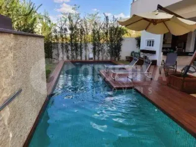 Casa de Condomínio com 4 Quartos à venda, 380m² no Nova Uberlândia, Uberlândia