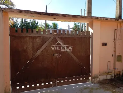 Casa com 2 Quartos para alugar, 70m² no Jardim Tarumãs, Caraguatatuba