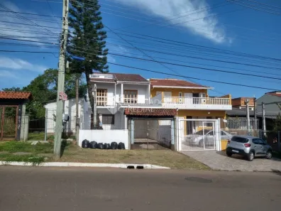 Casa com 4 Quartos à venda, 140m² no Jardim Algarve, Alvorada