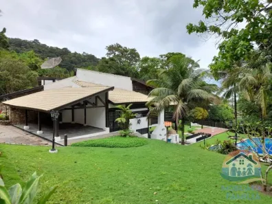 Casa de Condomínio com 4 Quartos à venda, 450m² no Guaecá, São Sebastião