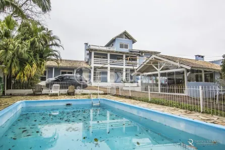 Casa com 4 Quartos à venda, 360m² no Vila Nova, Porto Alegre