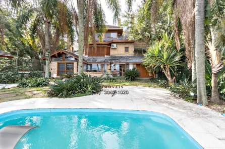 Casa com 4 Quartos para alugar, 394m² no Pedra Redonda, Porto Alegre