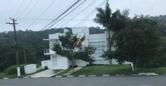 Casa de Condomínio com 5 Quartos para alugar, 566m² no Jardim Indaiá, Embu das Artes