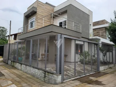 Casa com 3 Quartos para alugar, 90m² no Loteamento Jardim Timbaúva, Gravataí
