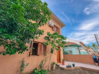 Casa de Condomínio com 6 Quartos à venda, 214m² no Fátima, Canoas