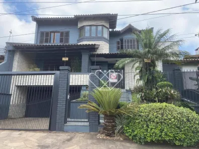 Casa com 3 Quartos para venda ou aluguel, 300m² no Dom Feliciano, Gravataí