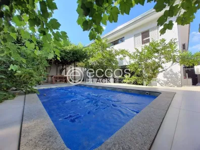 Casa de Condomínio com 4 Quartos à venda, 383m² no Nova Uberlândia, Uberlândia