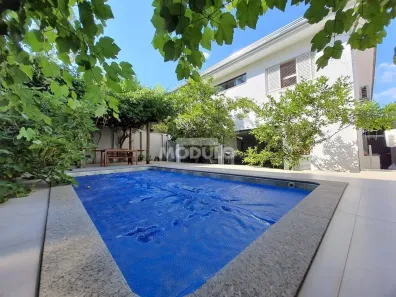 Casa de Condomínio com 4 Quartos à venda, 380m² no Nova Uberlândia, Uberlândia