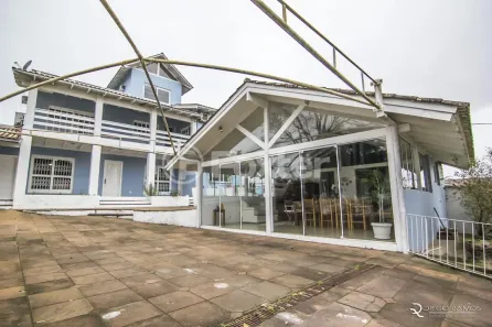 Casa com 4 Quartos à venda, 360m² no Vila Nova, Porto Alegre