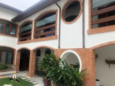 Casa de Condomínio com 4 Quartos para alugar, 400m² no Riviera, Bertioga