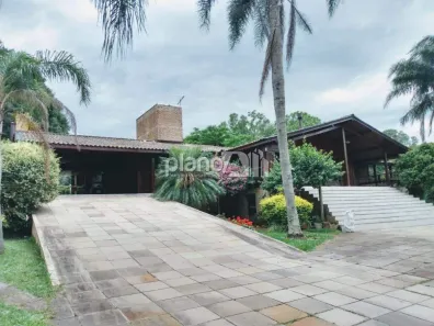 Casa de Condomínio com 4 Quartos à venda, 300m² no Mato Alto, Gravataí