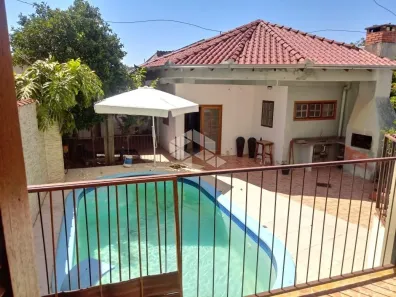 Casa com 6 Quartos à venda, 460m² no Campo Novo, Porto Alegre