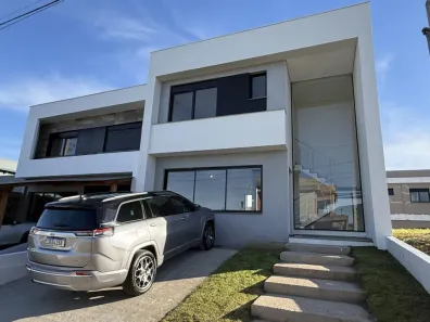 Casa de Condomínio com 3 Quartos à venda, 137m² no Cocão, Viamão