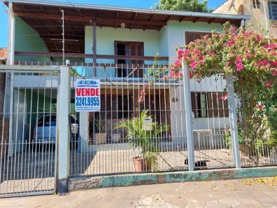 Casa com 6 Quartos à venda, 247m² no Cavalhada, Porto Alegre
