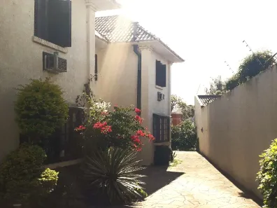 Casa de Condomínio com 3 Quartos para alugar, 203m² no Guarujá, Porto Alegre