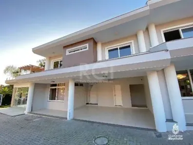 Casa de Condomínio com 3 Quartos para alugar, 372m² no Pedra Redonda, Porto Alegre