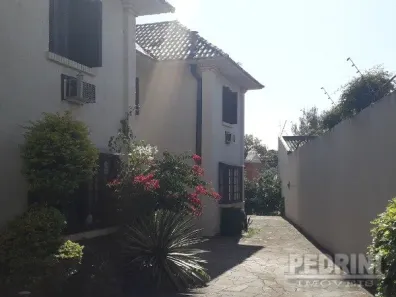 Casa de Condomínio com 3 Quartos para alugar, 138m² no Guarujá, Porto Alegre