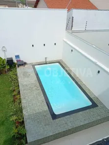 Casa de Condomínio com 3 Quartos à venda, 125m² no Jardim Holanda, Uberlândia