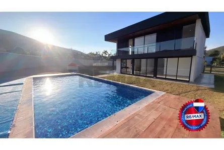 Casa de Condomínio com 4 Quartos à venda, 360m² no Balneário Água Limpa, Nova Lima
