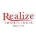 Miniatura da foto de Realize Imobiliária