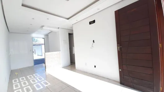 Casa com 3 Quartos para alugar, 74m² no Jardim Algarve, Alvorada