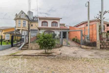 Casa com 4 Quartos à venda, 244m² no Cavalhada, Porto Alegre