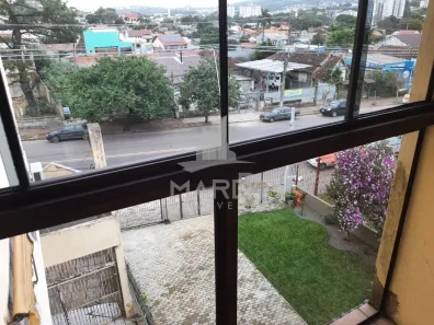 Apartamento com 2 Quartos para alugar, 60m² no Camaquã, Porto Alegre