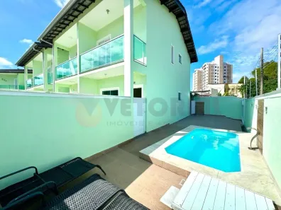 Casa de Condomínio com 2 Quartos à venda, 75m² no Jardim Porto Novo, Caraguatatuba