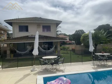 Casa de Condomínio com 4 Quartos para alugar, 750m² no Busca Vida (Abrantes), Camaçari